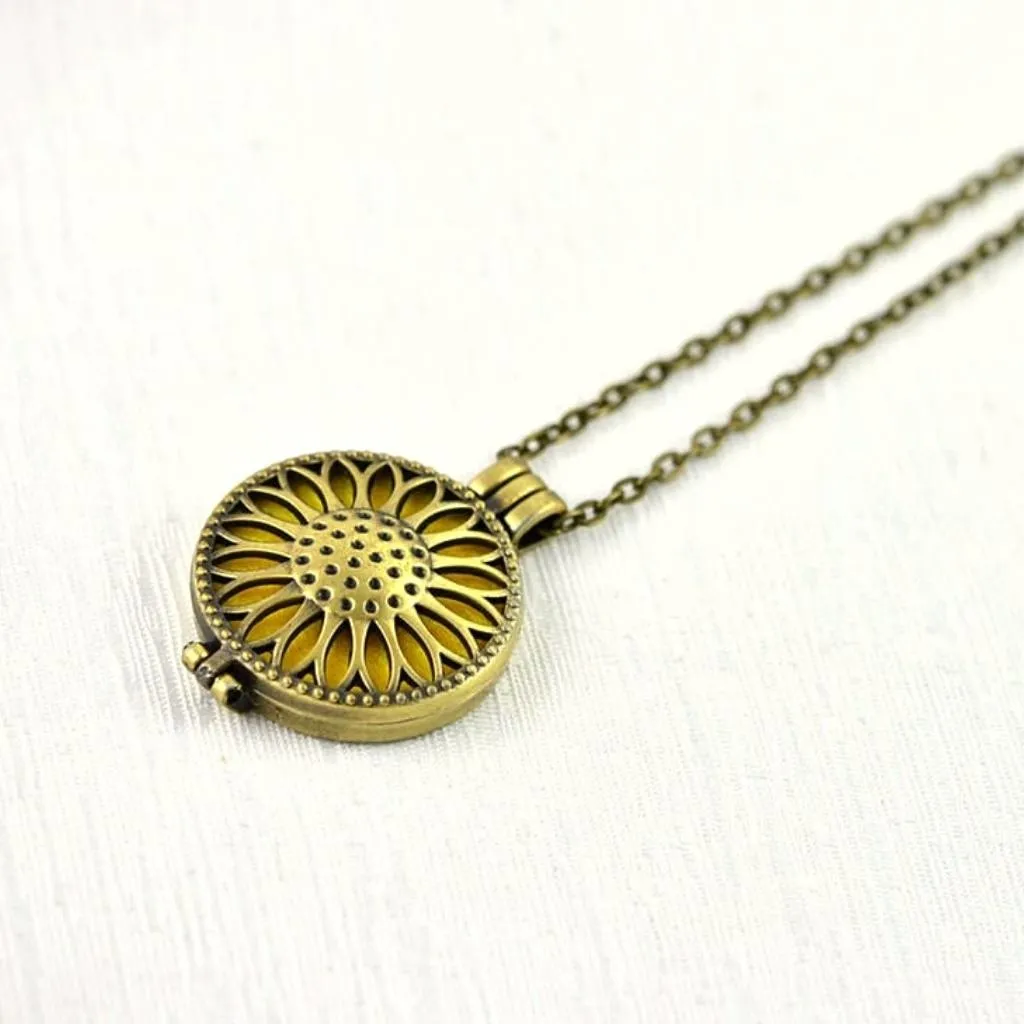 Essential Oil Diffuser Locket Necklace - Bronze Sunflower Filigree