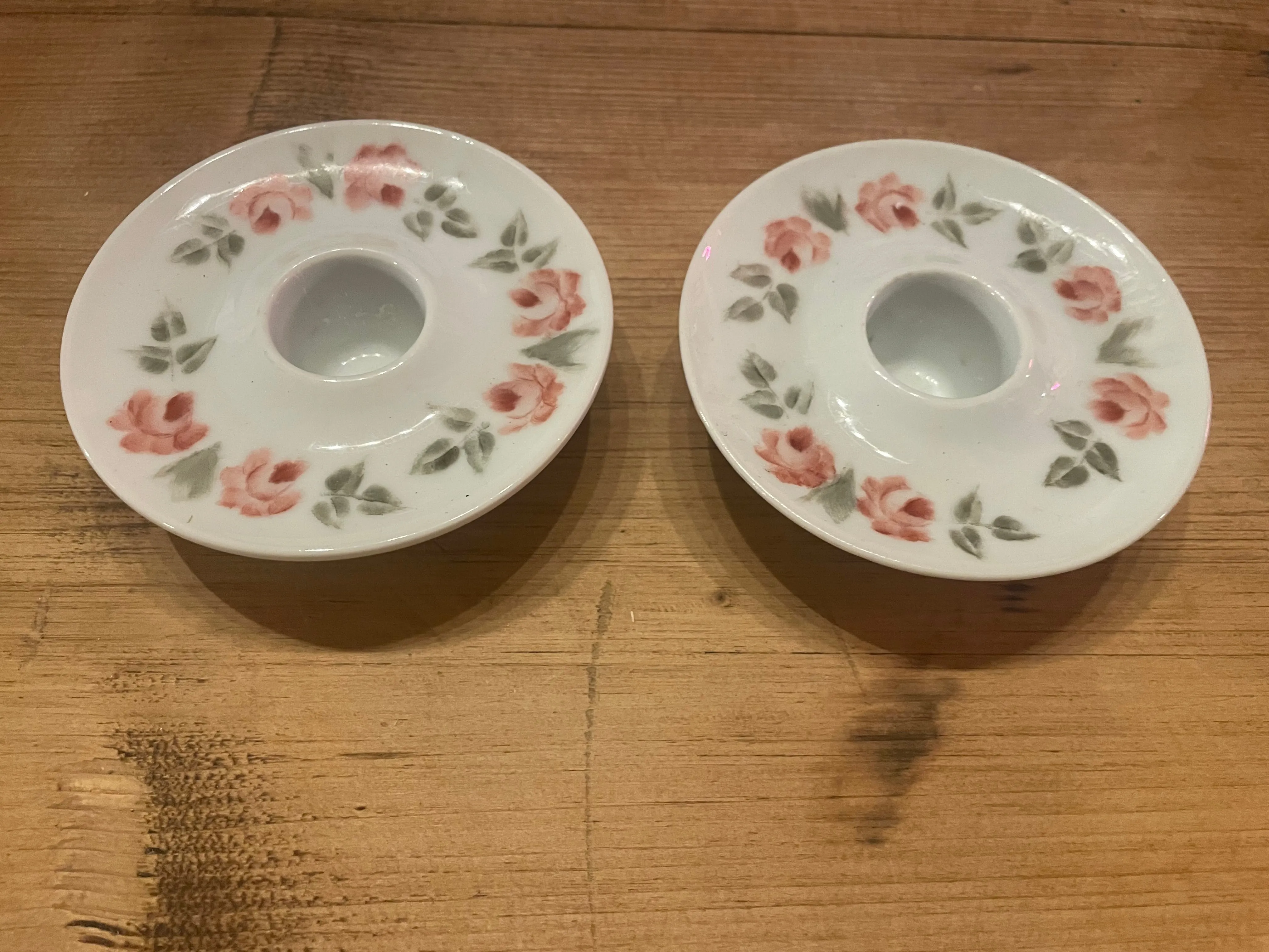 Pair of ceramic rose candle stick holders